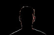 dark backlight shadow silhouette of male person, incognito unknown profile