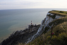 Beachy Head Lighthouse Viewed From The Top Of Beach Head Cliff. Eastbourne, United Kingdom.