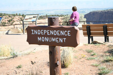 Wooden Sign Text Independence Monument In The Entrance Of  Independence Monument In Colorado, USA