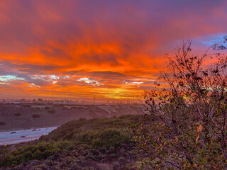 Wall Mural - scenic view of a bright sunset sky over the horizon
