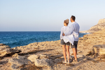 Wall Mural - Mature couple resting at sea resort.