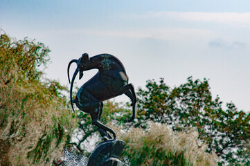 Poster - Beautiful shot of bronze antelope sculpture in the garden