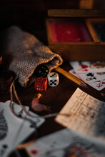 Playing Cards With Game Dices And Pencil On A Table