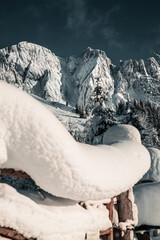 Sticker - Close-up of snowdrift in the forested mountains on a sunny day