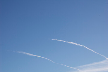 Sticker - Beautiful view of the plane contrails in the clear blue sky.