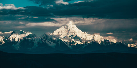 Wall Mural - Beautiful view of mountains under the cloudy sky