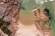 © Chris Holman/Wirestock - Closeup of a rocky coastline