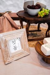 Poster - Closeup of a wooden picture frame on the table