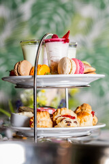 Poster - Festive table full of different appetizing desserts in the restaurant