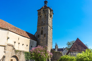 Poster - Medieval Klingentor tower in Rothenburg ob der Tauber in Germany against blue sky