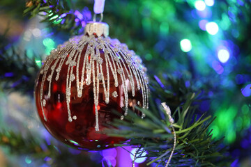 Poster - Closeup of the red Christmas tree bubble.