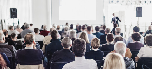 Wall Mural - speaker at business conference with public presentations. audience at the conference hall. business 