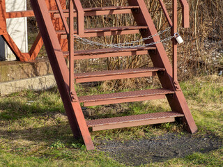 Sticker - Closeup shot of aged ladder with lock on it