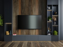Wooden Wall Mounted Tv In Modern Living Room With Decoration On Dark Wall Background.