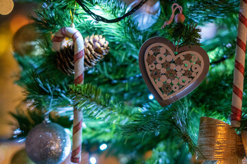 Poster - Multiple Christmas decoration hanging on the fir tree