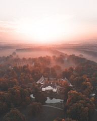 Wall Mural - Aerial view of a building in an autumn park