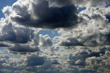 Wall Mural - scenic view of a sky with dark rainy clouds