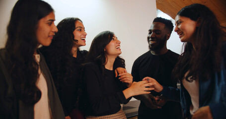 Poster - Group of South Asian friends laughing together - friendship concept