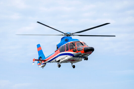 A helicopter flying in the sky.