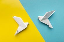 Two White Birds As A Symbol Of Peace On On Blue And Yellow Pastel Paper Color For Background