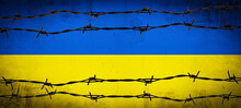 STOP WAR IN UKRAINE Background - Abstract Patriotic Yellow Blue Painted Colored Cracked Concrete Wall Texture With Barbed Wire Fence , In The Colors Of The Flag Of Ukraine