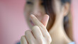 © LAONG - Asain woman making hands in mini heart shape, heart health insurance, social responsibility, happy charity volunteer, world heart day, appreciation concept, world mental health day