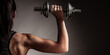© Samo Trebizan - Beautiful young woman workout with dumbbell over gray background in fitness gym club