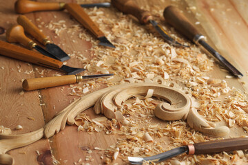 Canvas Print - Wood processing. Joinery work. Wood carving. Chisels for carving on the woodworker desk