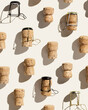 Pattern with champagne corks on beige background with hard light and shadow at sunlight. Summer wine drinks concept, bottle cap from sparkling wine and metal wire muselet, repeat pattern