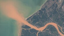 River Estuary Colored Water Sediment Geology, Kelantan River In Malaysia Aerial Satellite View From Sky. Animation Based On Image By Nasa