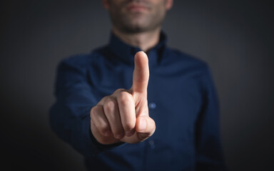 Wall Mural - businessman touching in empty screen.