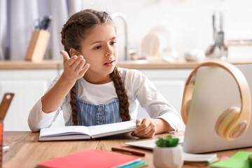 Sticker - Little girl studying Literature with online tutor at home