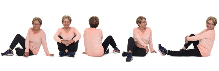 group of same senior woman sitting on the floor on white background