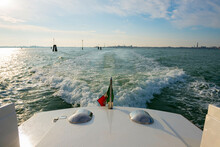 Elegant Motorboat With Italian Flag 21 On Mediterranean Sea In A Sunny Day In Venice, Veneto In Italy. 