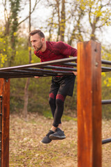 Wall Mural - Man doing pull ups