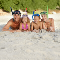 Sticker - That reef was amazing. A family in snorkeling gear lying on the sand at the beach.