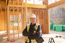 Portrait Confident Foreman In House Under Construction