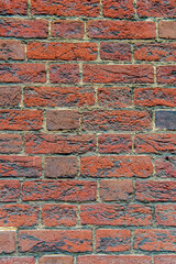 Wall Mural - brick wall of red textured brick.