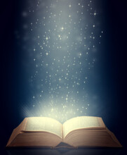 Be Drawn Into New Worlds. Shot Of An Open Storybook With Light Emanating From It.