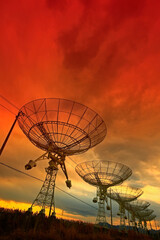 Wall Mural - the silhouette of a radio telescope observatory