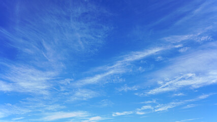 white clouds and blue sky suitable for background or sky replacement.