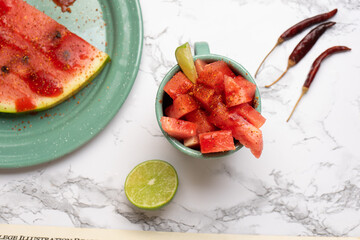 Wall Mural - Watermelon with chili powder and chamoy. Mexican food