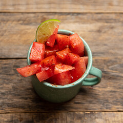 Wall Mural - Watermelon with chili powder and chamoy. Mexican food