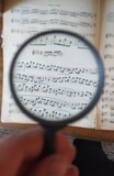 Fototapeta  - magnifying glass on the newspaper
