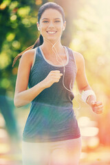 Sticker - Summertime running keeps her slim. Cropped shot of a young woman running in the park.