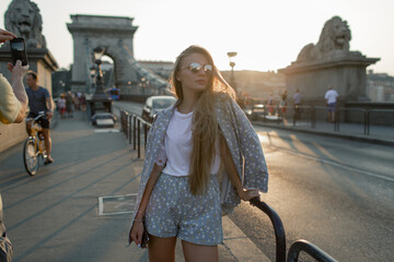 Sticker - Young beautiful girl in Budapest on the Chain Bridge