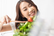 © Shutter B - Healthy lifestyle, Close up beautiful young asian woman cooking salad smiling happy. Healthy eating, Food and lifestyle, Health, Beauty, Dieting concept.