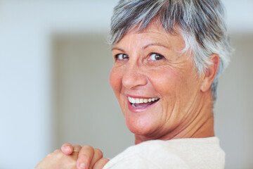 Sticker - Mature woman smiling at you. Closeup portrait of cheerful mature woman smiling at you.