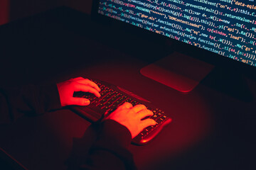 man using computer and programming to break code. cyber security threat. internet and network securi