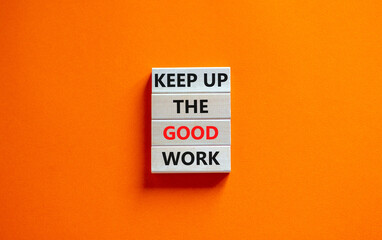 Wall Mural - Keep up the good work symbol. Concept words Keep up the good work on wooden blocks. Beautiful orange table orange background. Keep up the good work business concept. Copy space.